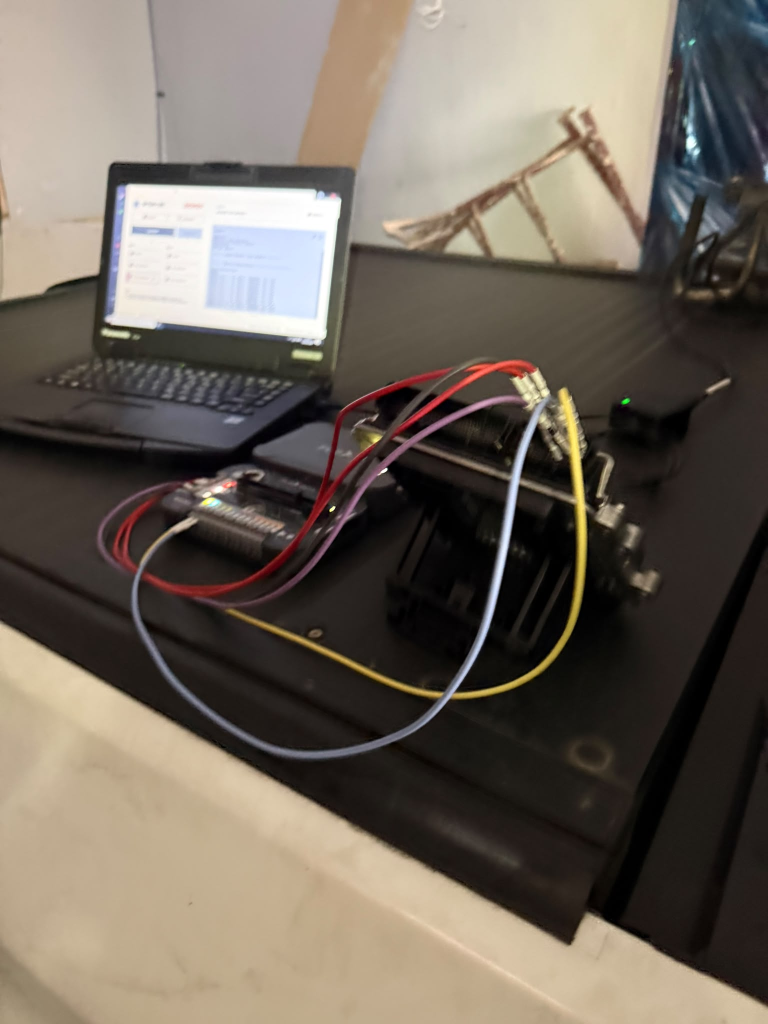 Vehicle module connected to a laptop for ECU programming work