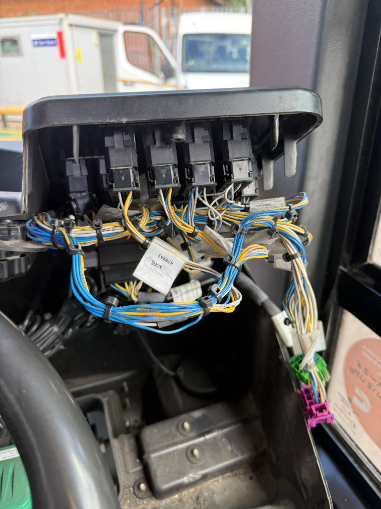 Vehicle wiring harness and connectors exposed for electrical fault finding